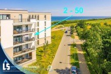 Au�enansicht vom Balkon, wo sie einen seitlichen Meerblick auf die Ostsee haben Luxuri�se Wohnung in Top-Anlage mit Wellness & Premium- Service in einem Aparthotel