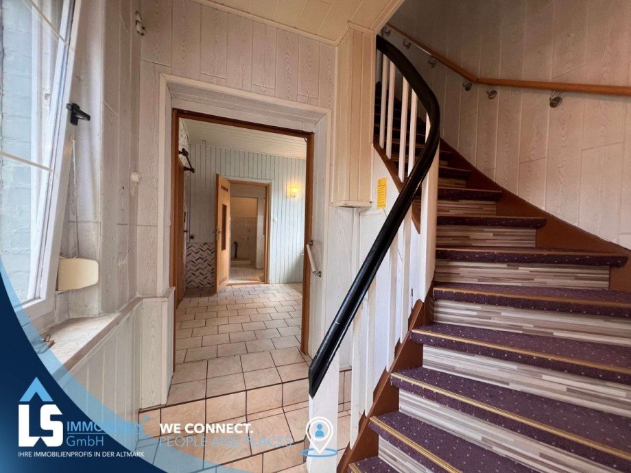 Treppe ins OG Doppelhaush�lfte Bittkau