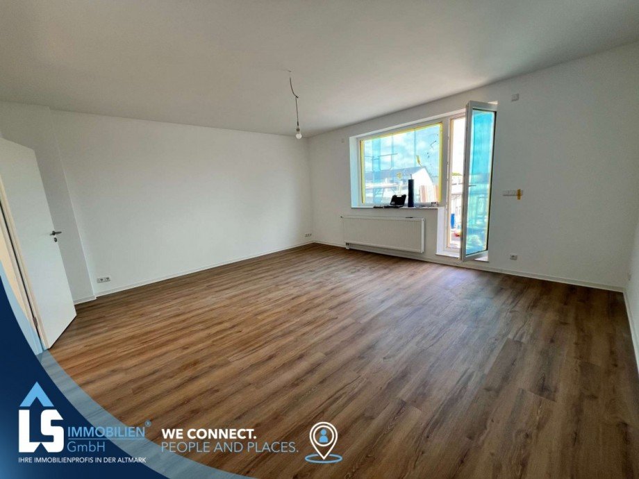 Wohnzimmer mit Balkon Wohnung Tangerm�nde